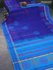 Silk cotton block printed saree blue and cs blue with warli butta prints and zari woven simple border