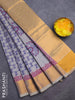 Silk cotton block printed saree pastel grey with allover prints and zari woven border