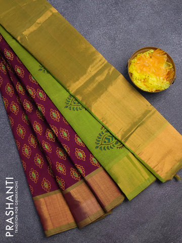 Silk cotton block printed saree dark purple and mehendi green with allover butta prints and zari woven border