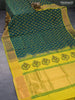 Silk cotton block printed saree peacock green and mustard yellow with allover butta prints and zari woven border