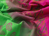 Silk cotton block printed saree parrot green and pink with paisley butta prints and zari woven border