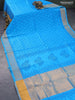 Silk cotton block printed saree light blue with allover butta prints and zari woven border