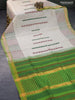 Silk cotton block printed saree cream and light green with allover butta prints and zari woven border