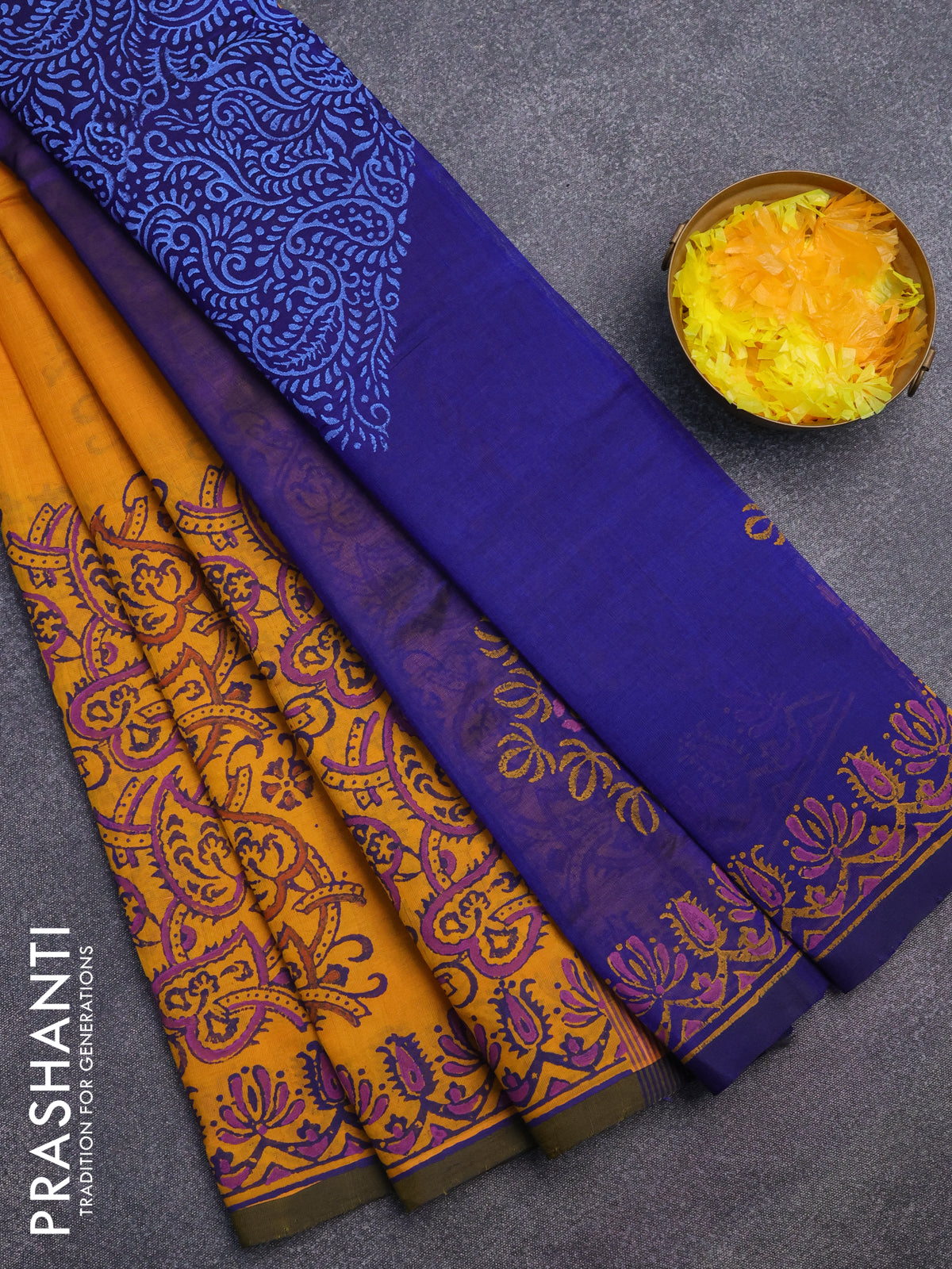 Silk cotton block printed saree yellow and blue with allover prints and printed border