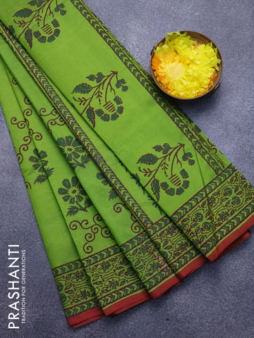 Silk cotton block printed saree light green and maroon shade with floral prints and printed border