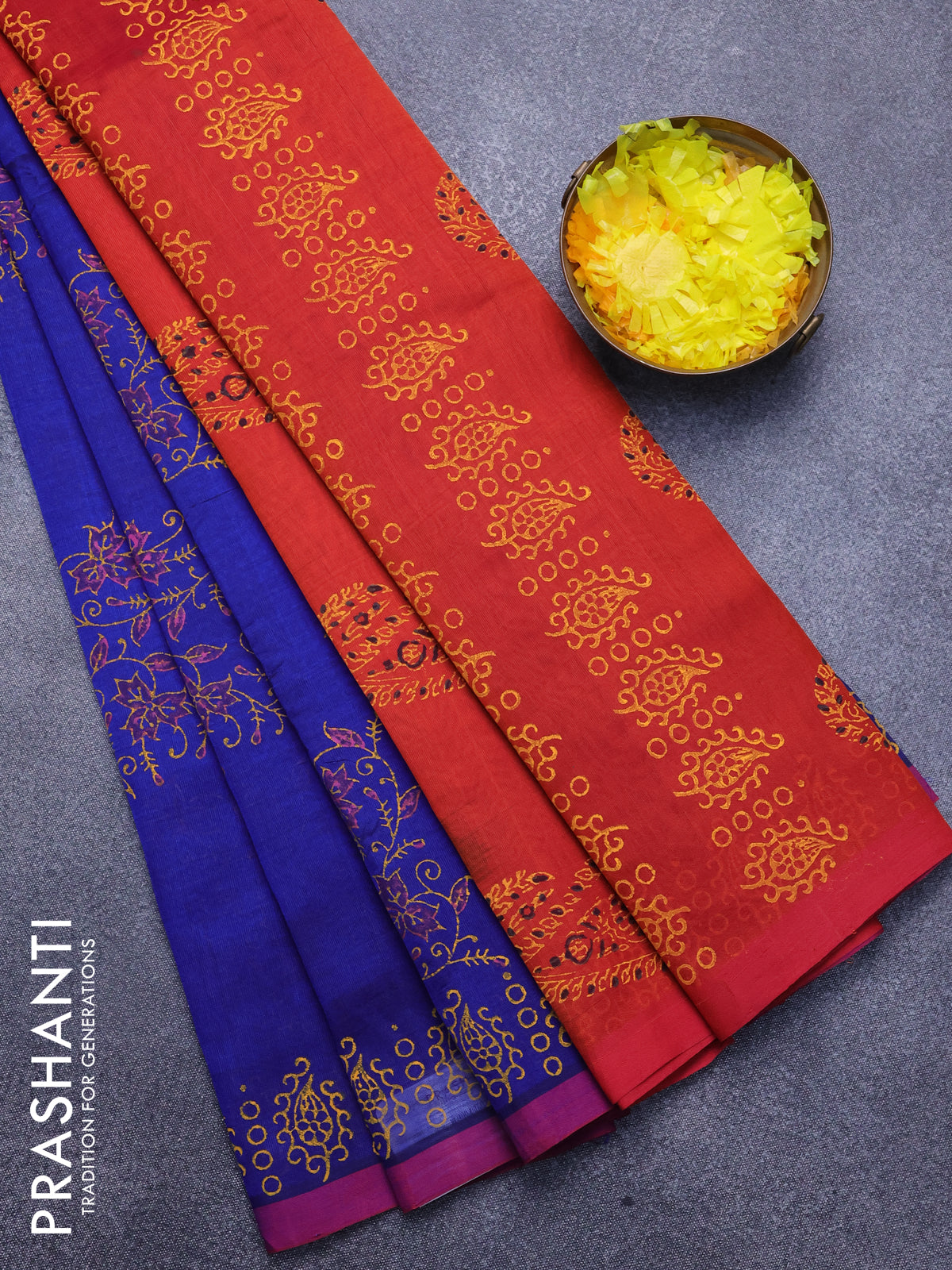 Silk cotton block printed saree blue and rustic orange with allover prints and printed border