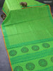 Silk cotton block printed saree light green and orange with allover butta prints and printed border