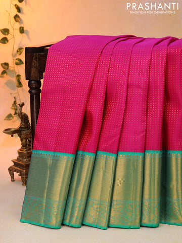 Pure kanjivaram silk saree pink and teal green with allover zari woven butta weaves and long zari woven korvai border