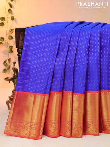 Pure kanjivaram silk saree blue and orange with allover zari woven butta weaves and long zari woven korvai border