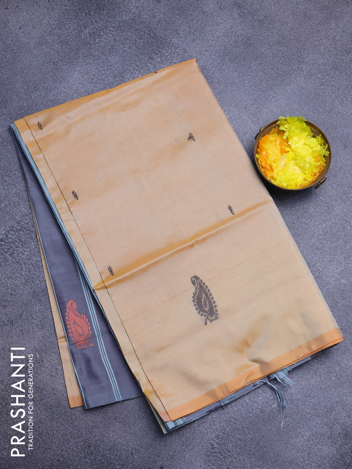 Banana pith saree pale orange shad and grey with thread woven buttas in borderless style