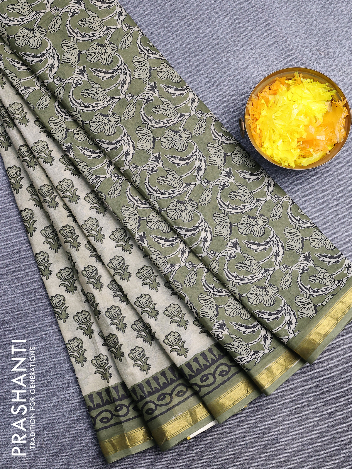 Muslin cotton saree cream and pastel green with allover floral butta prints and zari woven border