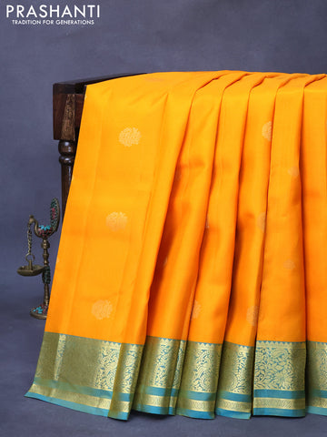 Pure kanjivaram silk saree mango yellow and dual shade of teal blue with zari woven buttas and zari woven border