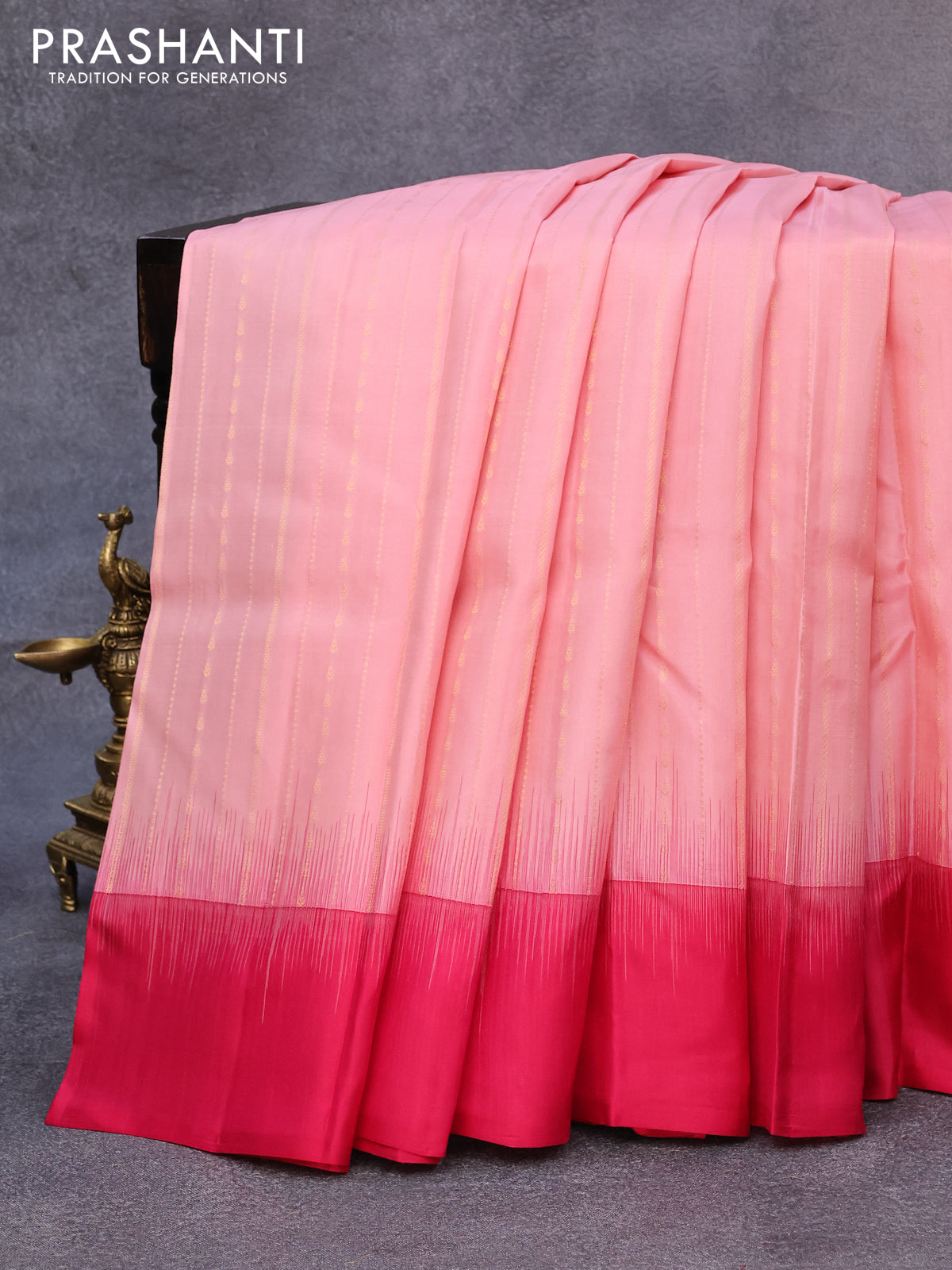 Pure kanjivaram silk saree peach pink and pink with allover zari weaves and simple border