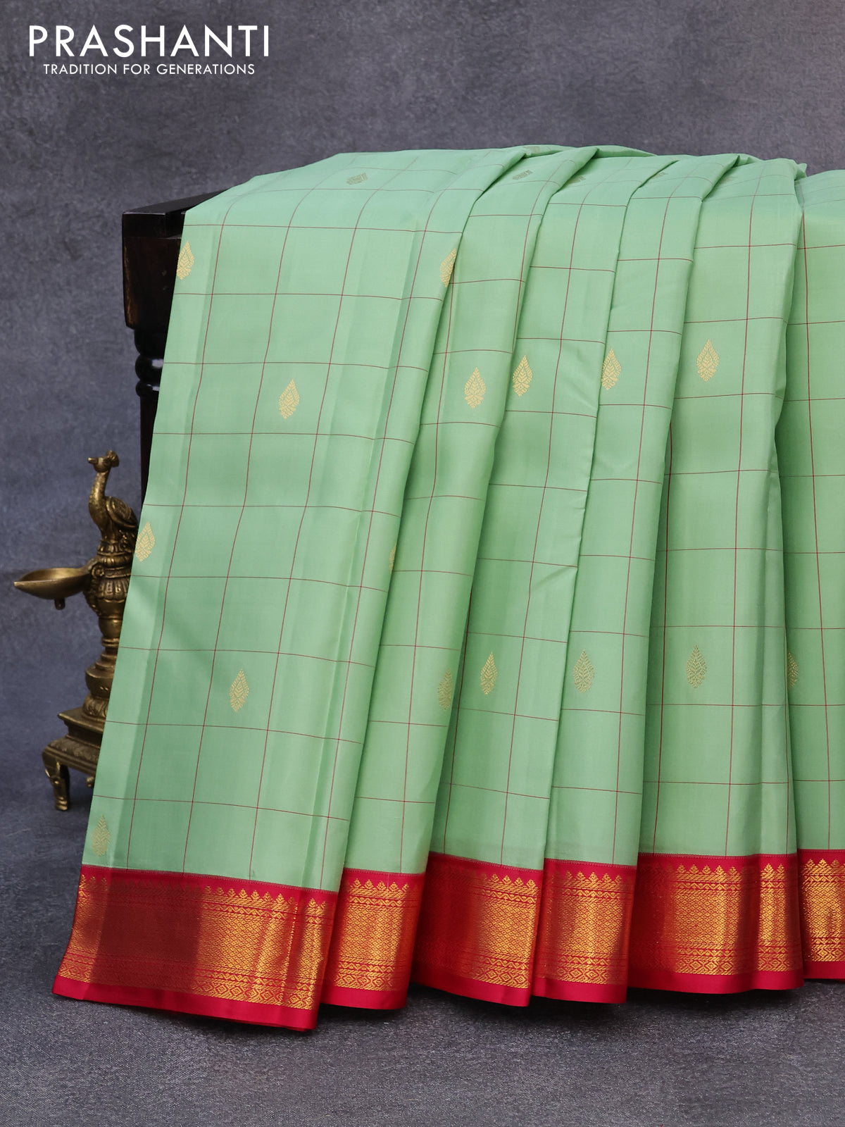 Pure kanjivaram silk saree pastel green and pink with allover checked pattern & zari buttas and zari woven korvai border