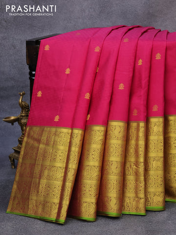 Pure kanjivaram silk saree magenta pink and light green with allover self emoss & zari buttas and long zari woven border