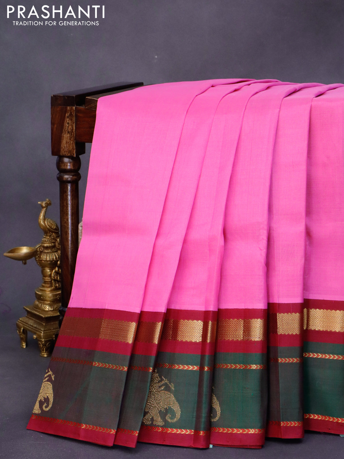 Silk cotton saree light pink and maroon with plain body and rettapet zari woven korvai border