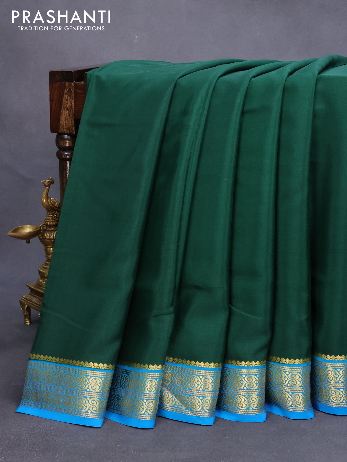 Mysore silk saree dark green and light blue with plain body and zari woven border