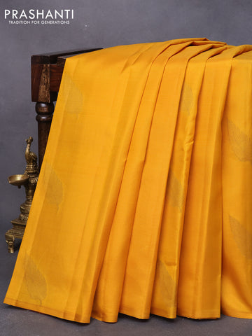 Pure kanjivaram silk saree mustard yellow and light pink with zari woven leaf buttas in borderless style