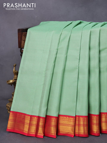 Pure kanjivaram silk saree pastel green and red with allover checked pattern and zari woven korvai border