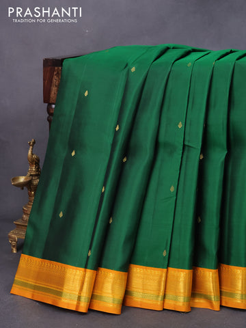 Pure kanjivaram silk saree green and mustard yellow with zari woven buttas and zari woven korvai border