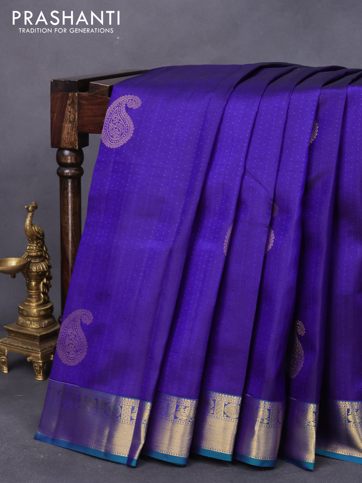 Pure kanjivaram silk saree blue and teal green with allover self emboss & paisley zari buttas and zari woven border