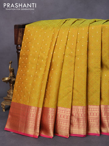 Pure kanjivaram silk saree green shade and pink with allover self emboss & zari buttas and zari woven border