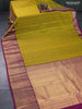 Pure kanjivaram silk saree mustard green and magenta pink with allover zari woven buttas and long zari woven border