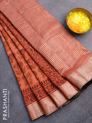 Chanderi silk cotton saree rustic orange and black with natural vegetable prints and zari woven gotapatti lace border