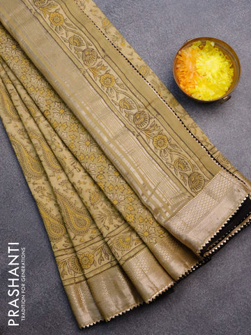 Chanderi silk cotton saree elaichi green and black with natural vegetable prints and zari woven gotapatti lace border