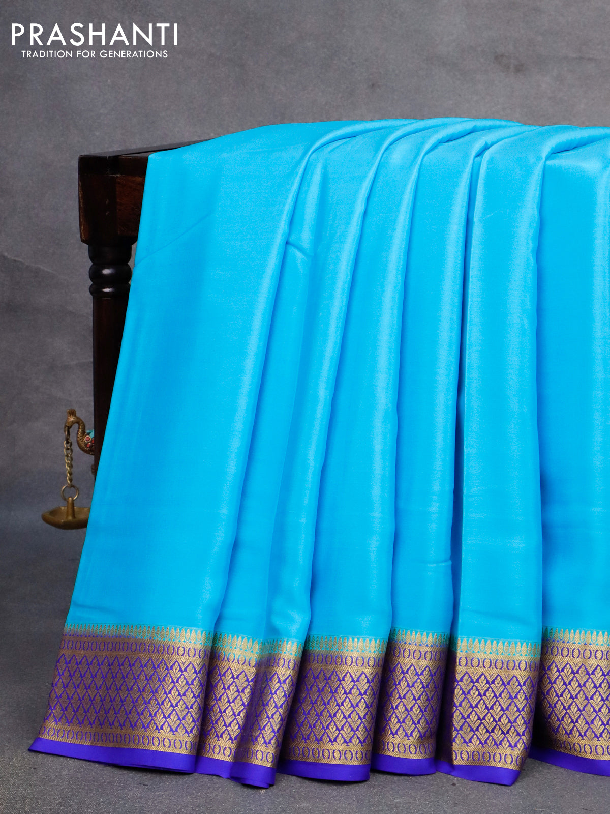 Pure mysore silk saree light blue and blue with plain body and long rettapet zari woven border