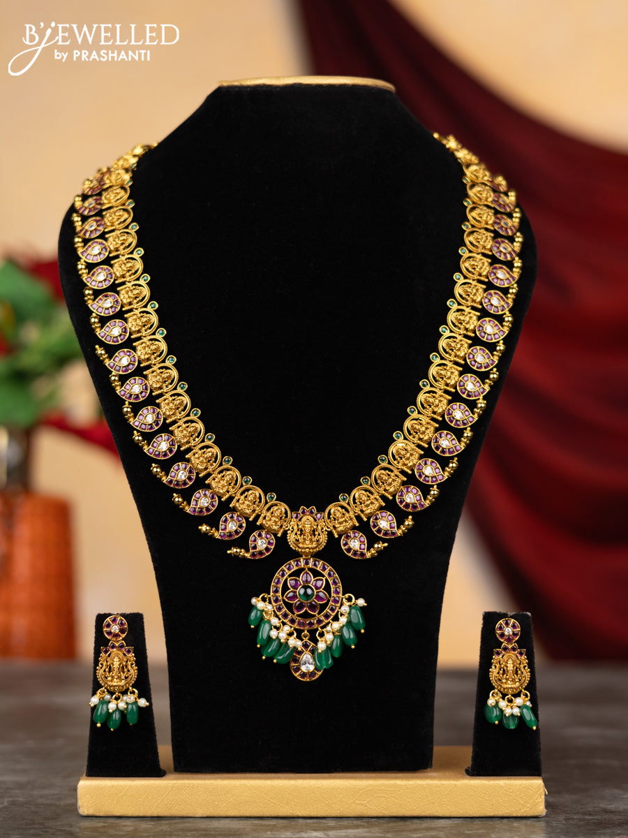 Antique haram lakshmi & manga design with kemp & cz stones and pearl & green beads hangings