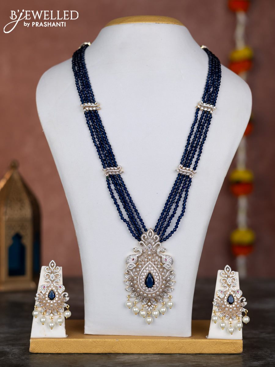 Beaded blue necklace with sapphire & cz stones and pearl hangings in zircon finish