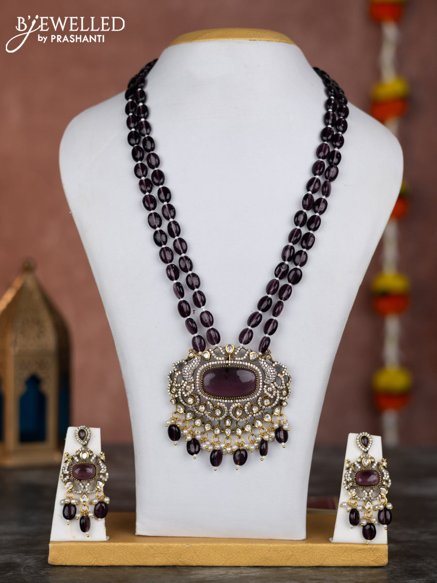 Beaded double layer purple necklace with kundan & cz stones and pearl hangings in victorian finish