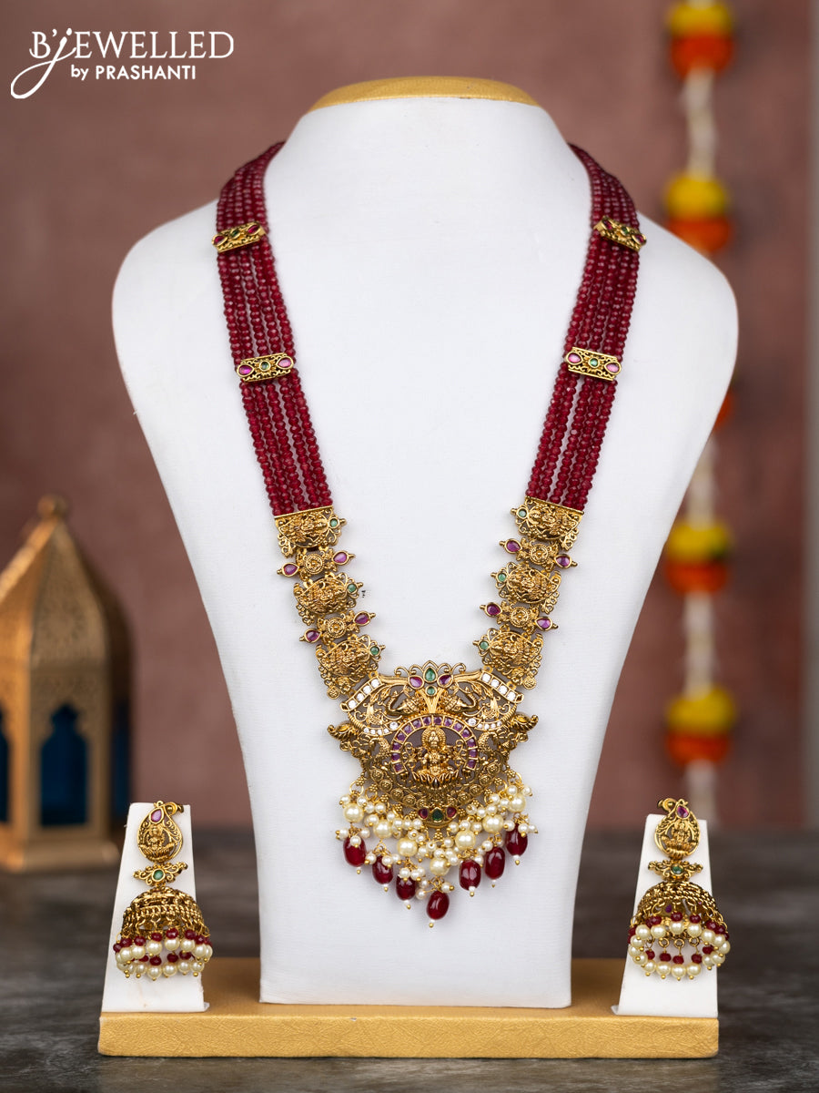 Beaded multilayer maroon necklace lakshmi pendant with kemp & cz stones and pearl hangings in victorian finish