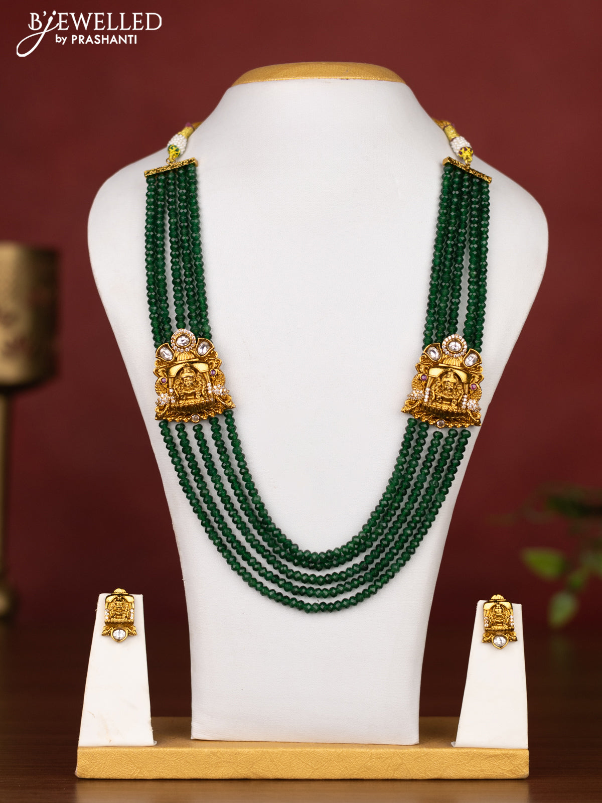 Beaded multilayer green necklace lakshmi design with cz stones