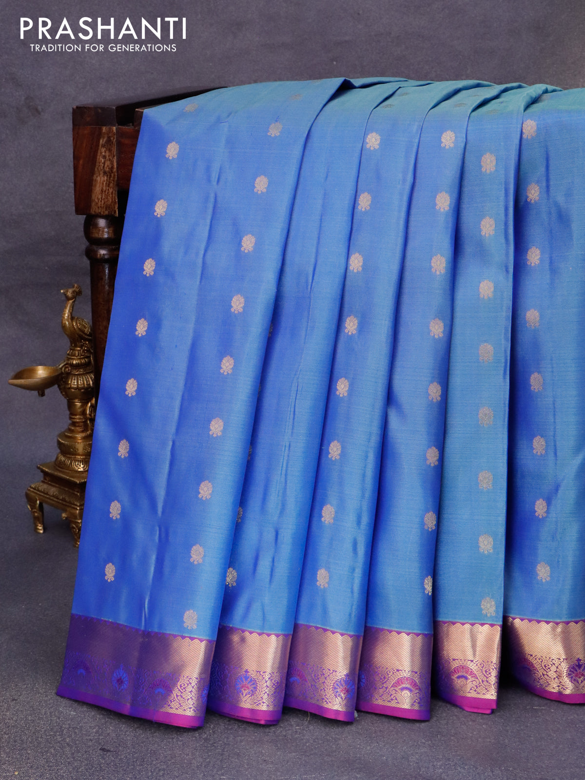 Pure kanjivaram silk saree dual shade of blue and purple with zari woven buttas and zari woven border