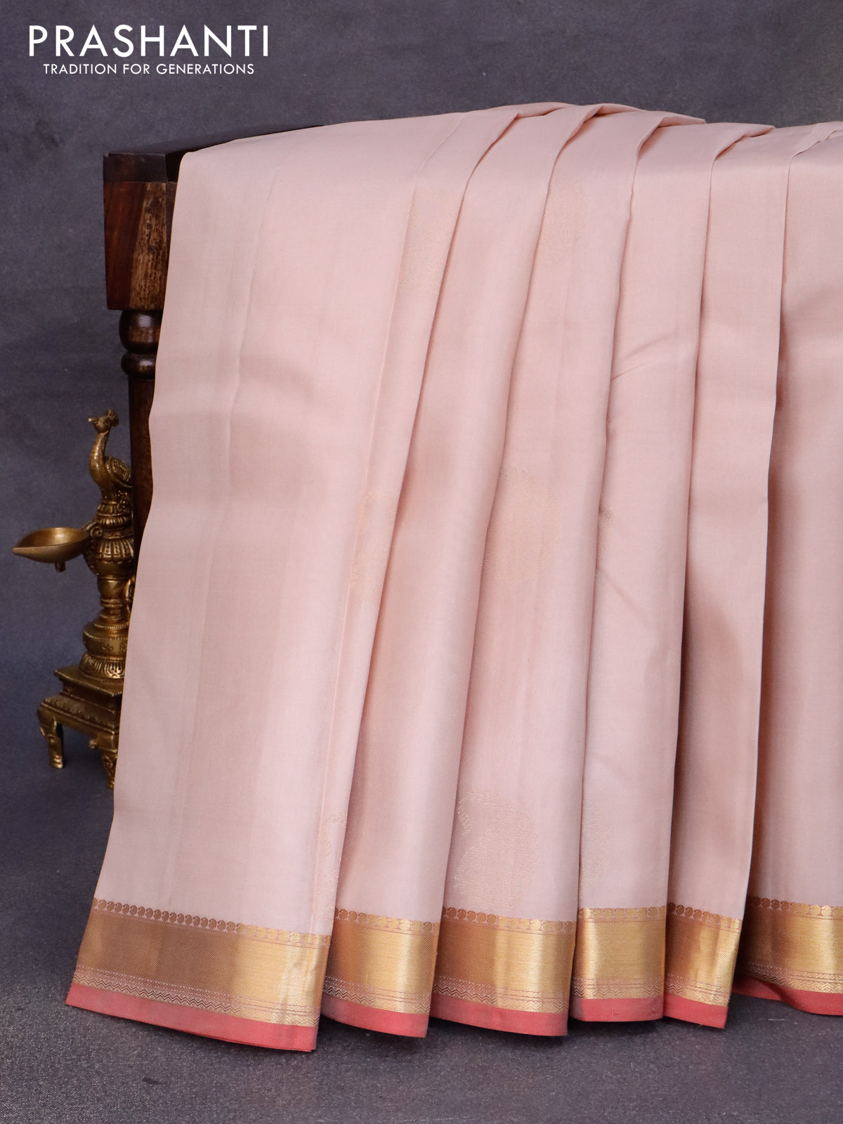Pure kanjivaram silk saree pastel peach and reddish pink with paisley zari woven buttas and zari woven border