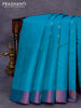 Pure kanjivaram silk saree teal blue and dual shade of purple with zari woven buttas and zari woven butta border