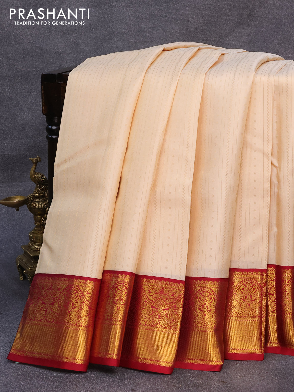 Pure kanjivaram silk saree cream and maroon with allover zari weaves and annam zari woven korvai border