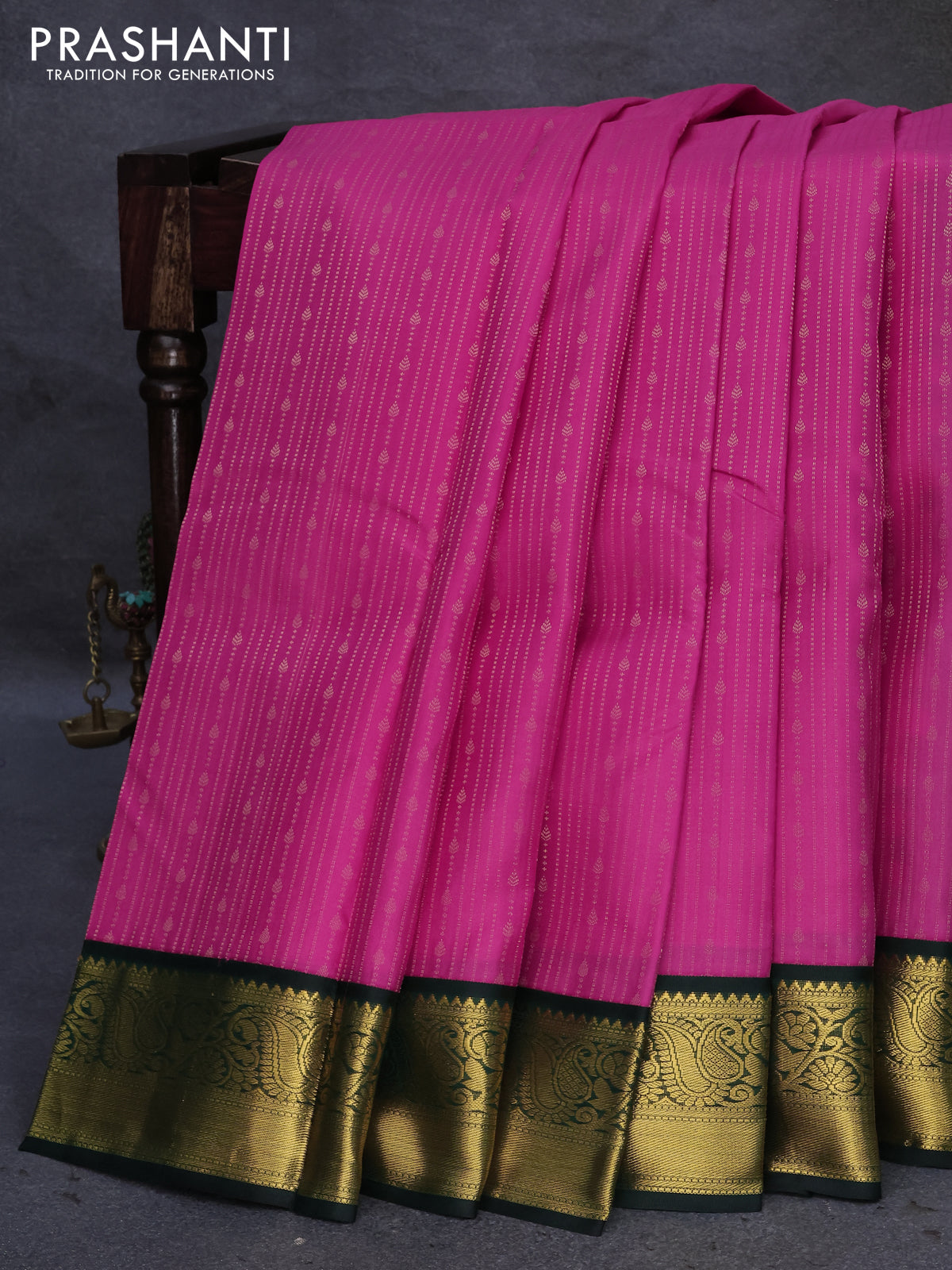 Pure kanjivaram silk saree pink and bottle green with allover zari weaves and zari woven korvai border