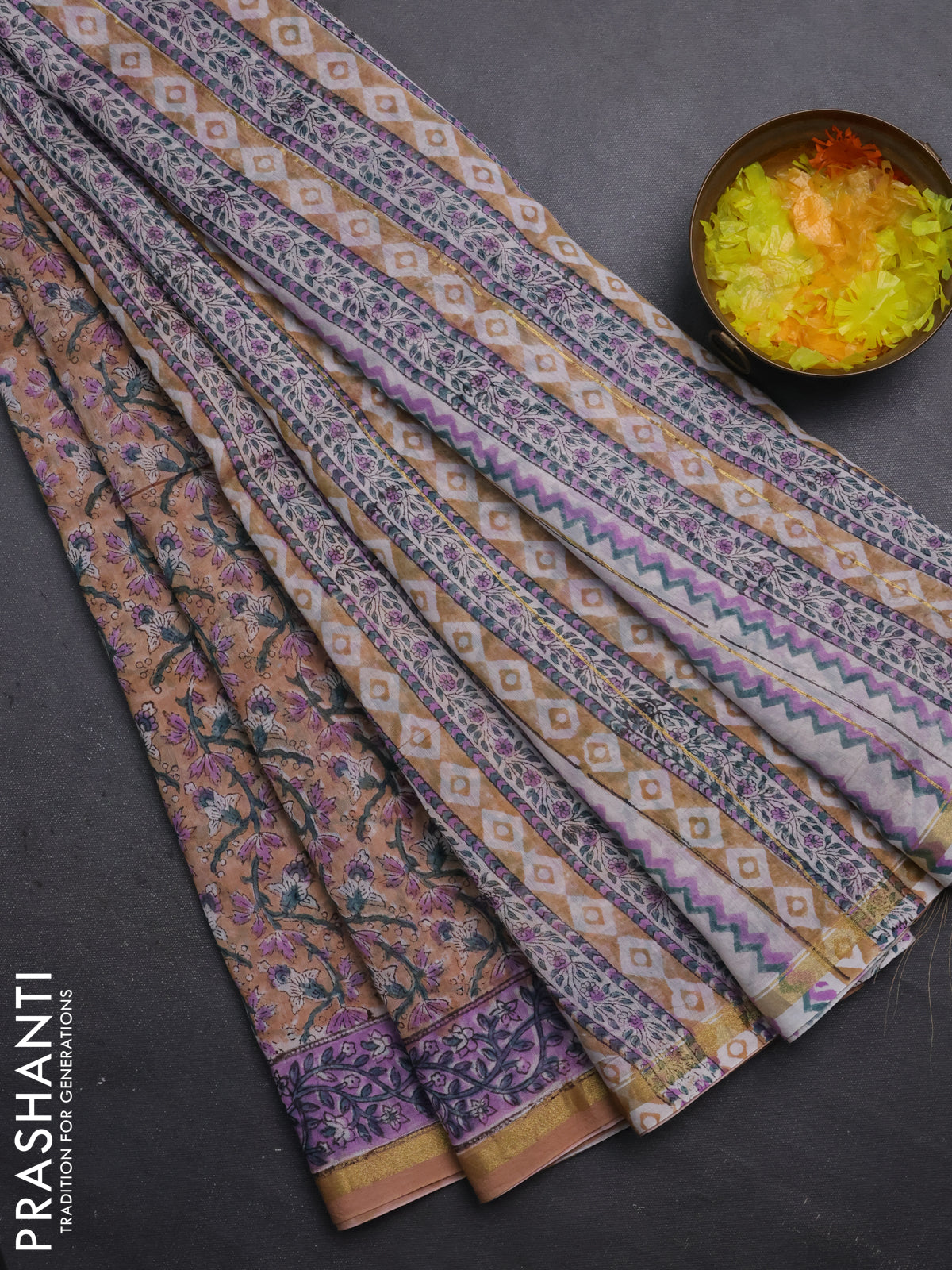 Chanderi bagru saree sandal and lavender with allover floral prints and small zari woven border