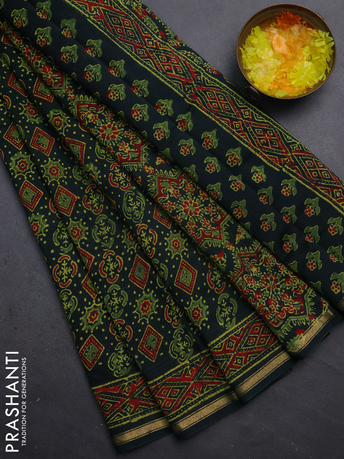 Chanderi bagru saree bottle green with allover ajrakh prints and small zari woven border