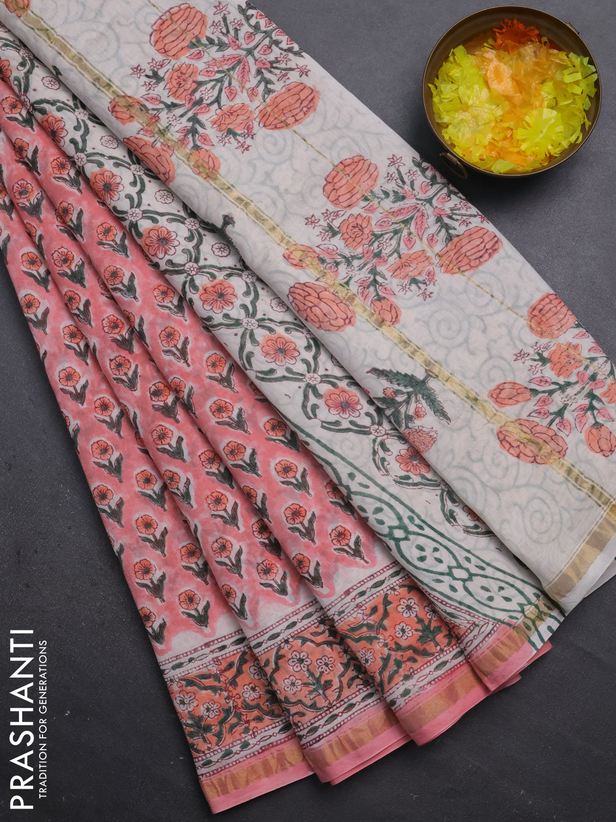 Chanderi bagru saree peach pink with floral butta prints and small zari woven border