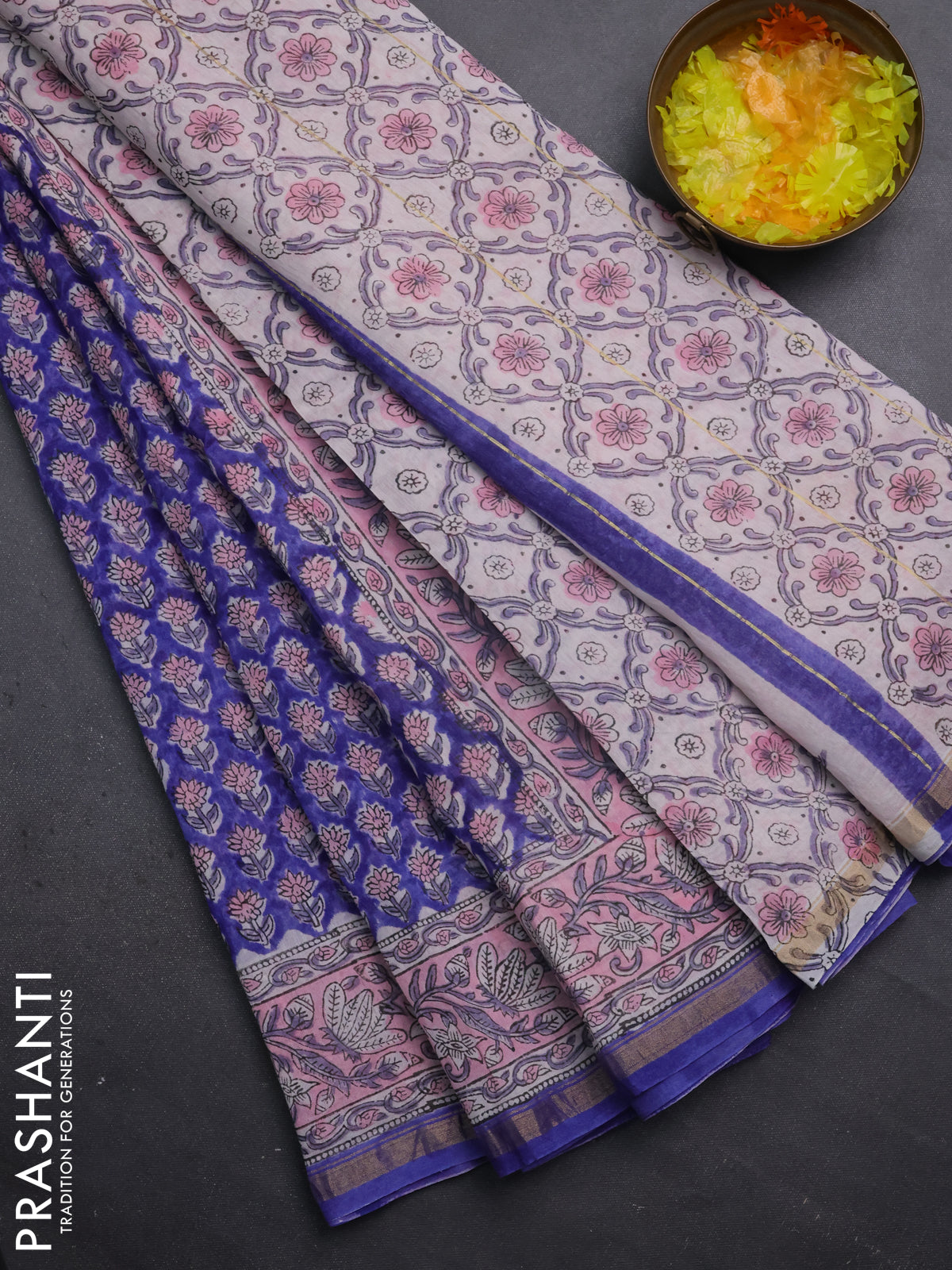 Chanderi bagru saree blue with floral butta prints and small zari woven border