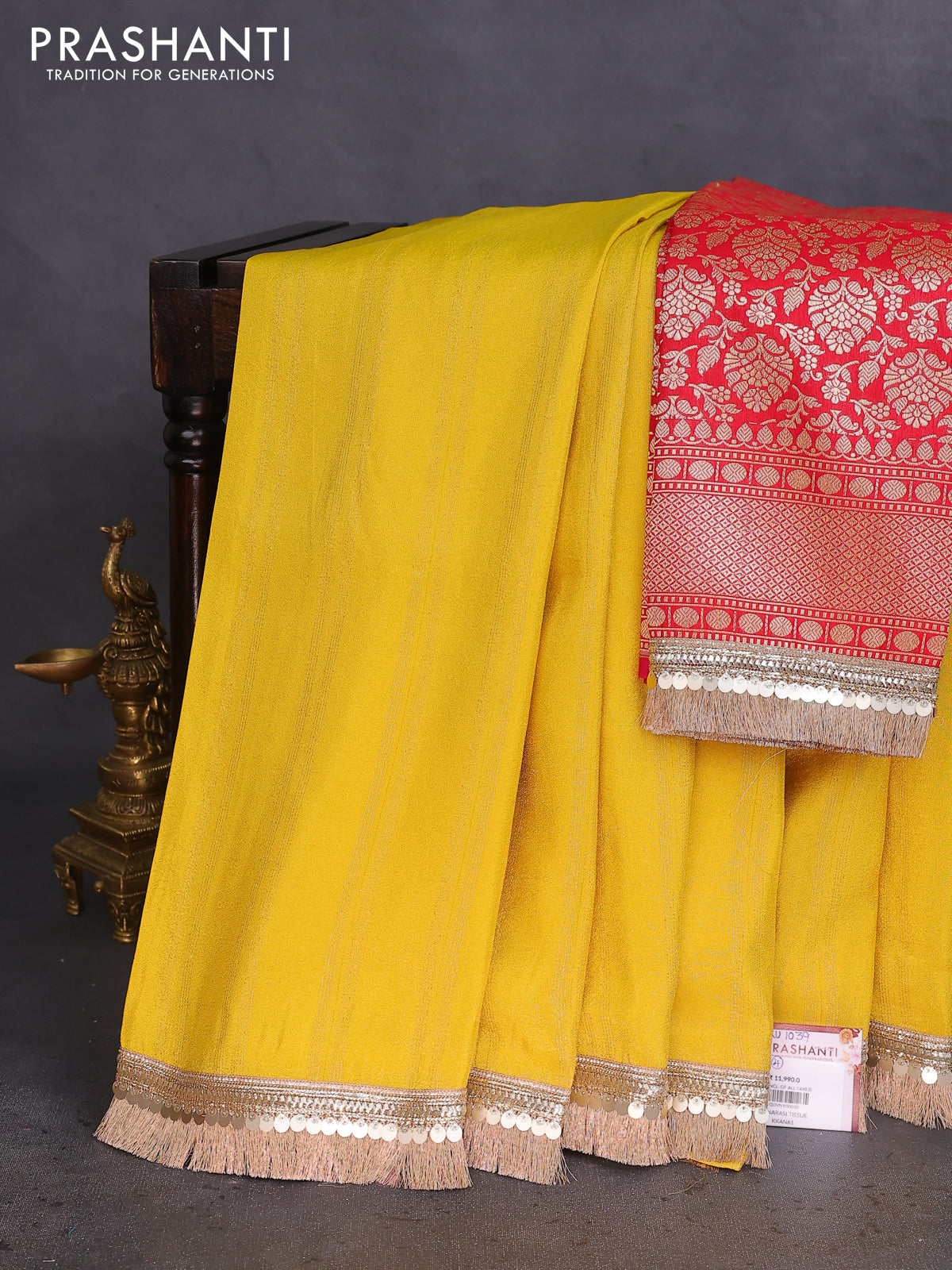 Banarasi tissue saree yellow and red with zari stripes pattern and lace work border