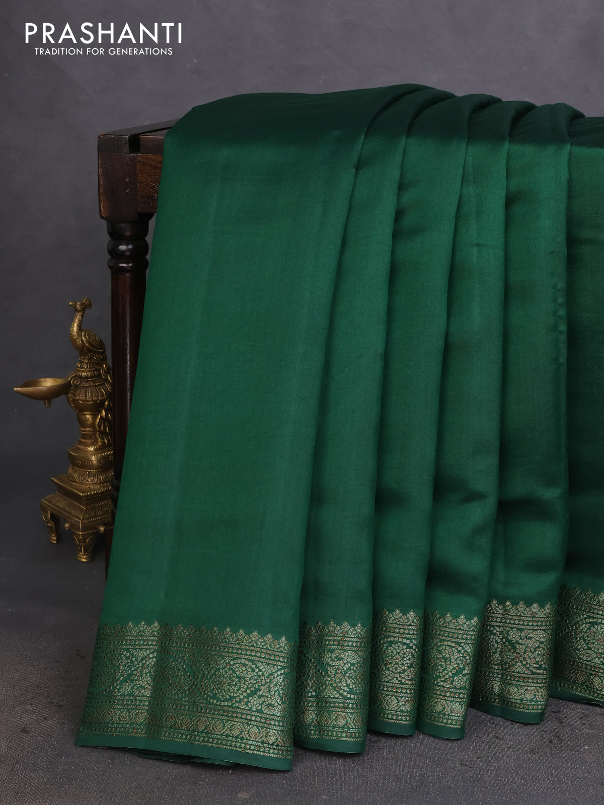 Chiniya silk saree green and maroon with plain body and woven border