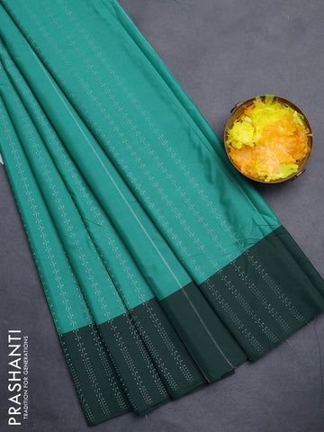 Arani semi silk saree teal green and dark green with allover silver & copper zari weaves and zari woven border