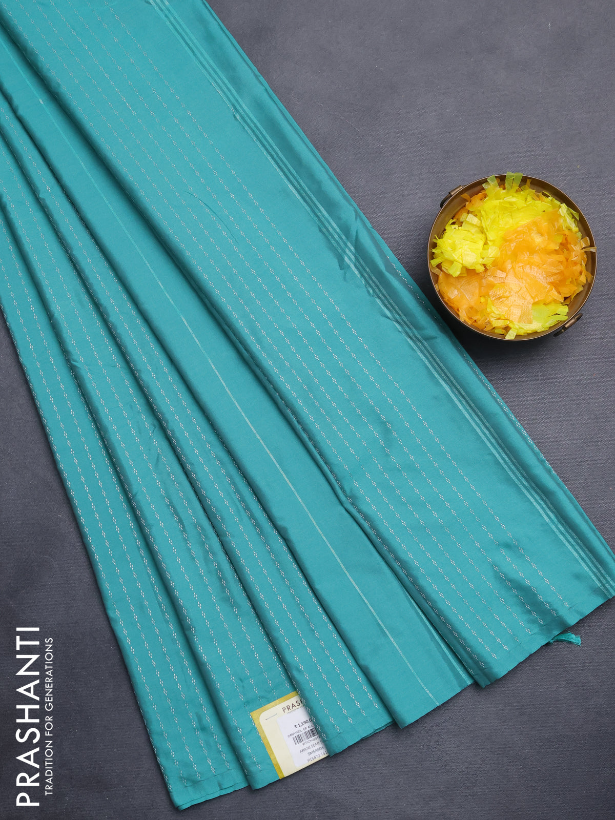 Arani semi silk saree teal green with allover silver zari weaves in borderless style