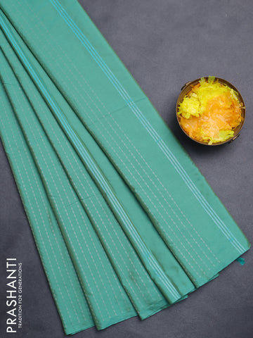 Arani semi silk saree teal green with allover silver zari weaves in borderless style