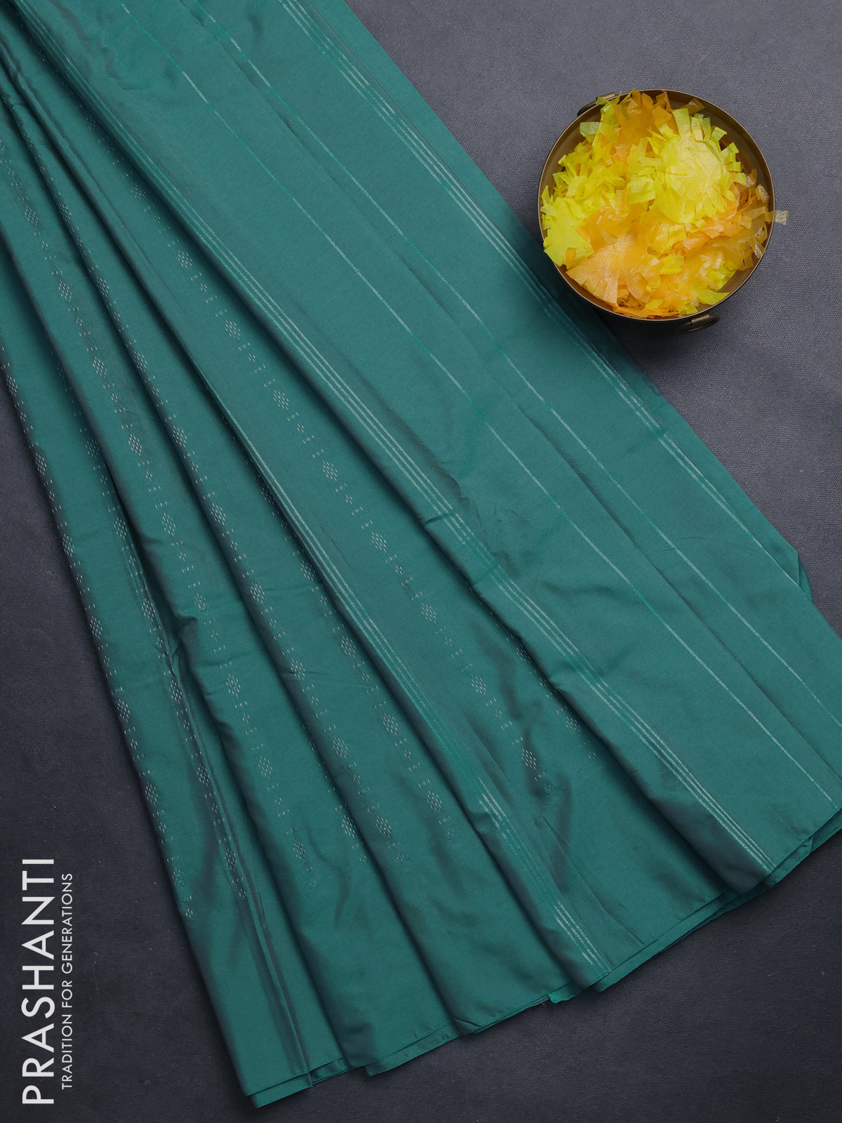 Arani semi silk saree teal green with allover silver zari weaves in borderless style